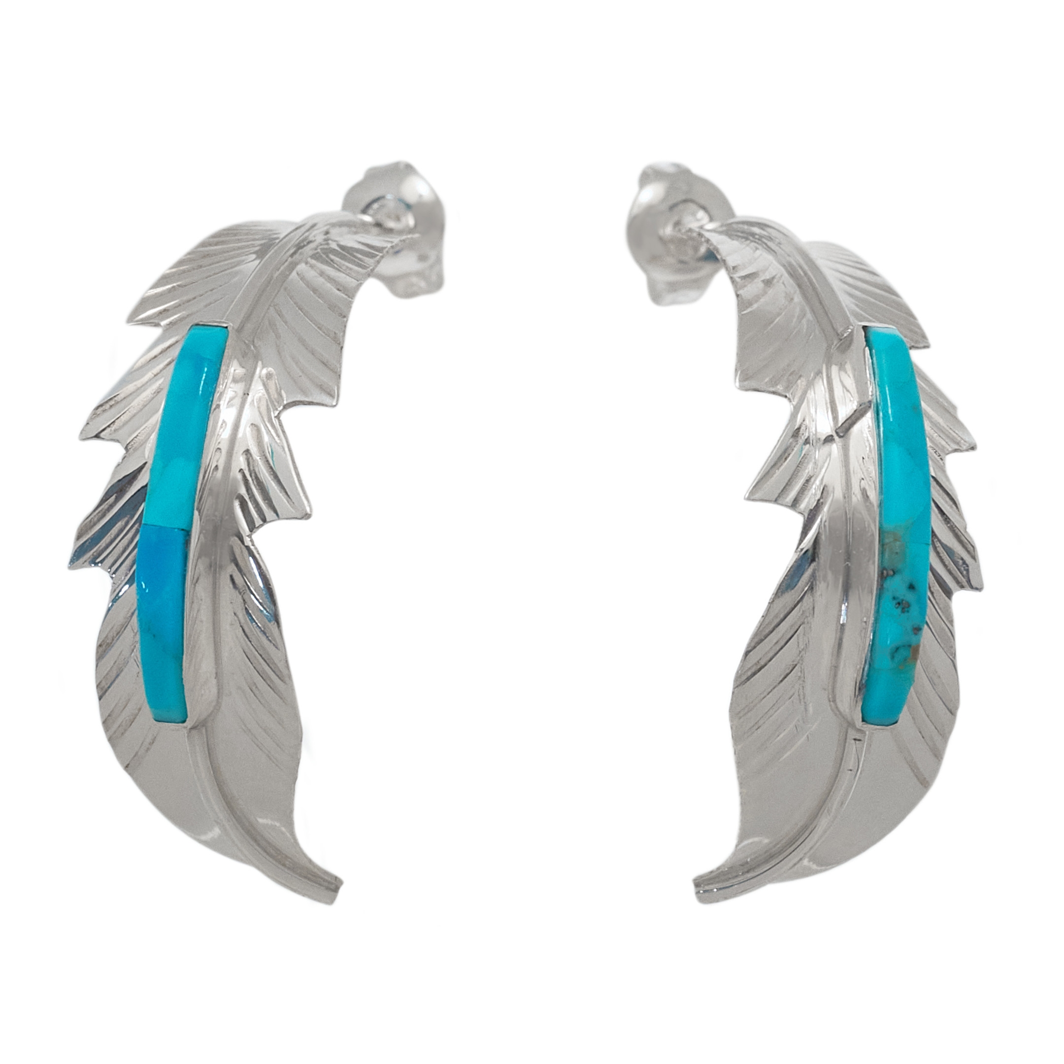 Navajo earrings. Curved feathers with a finely carved turquoise.