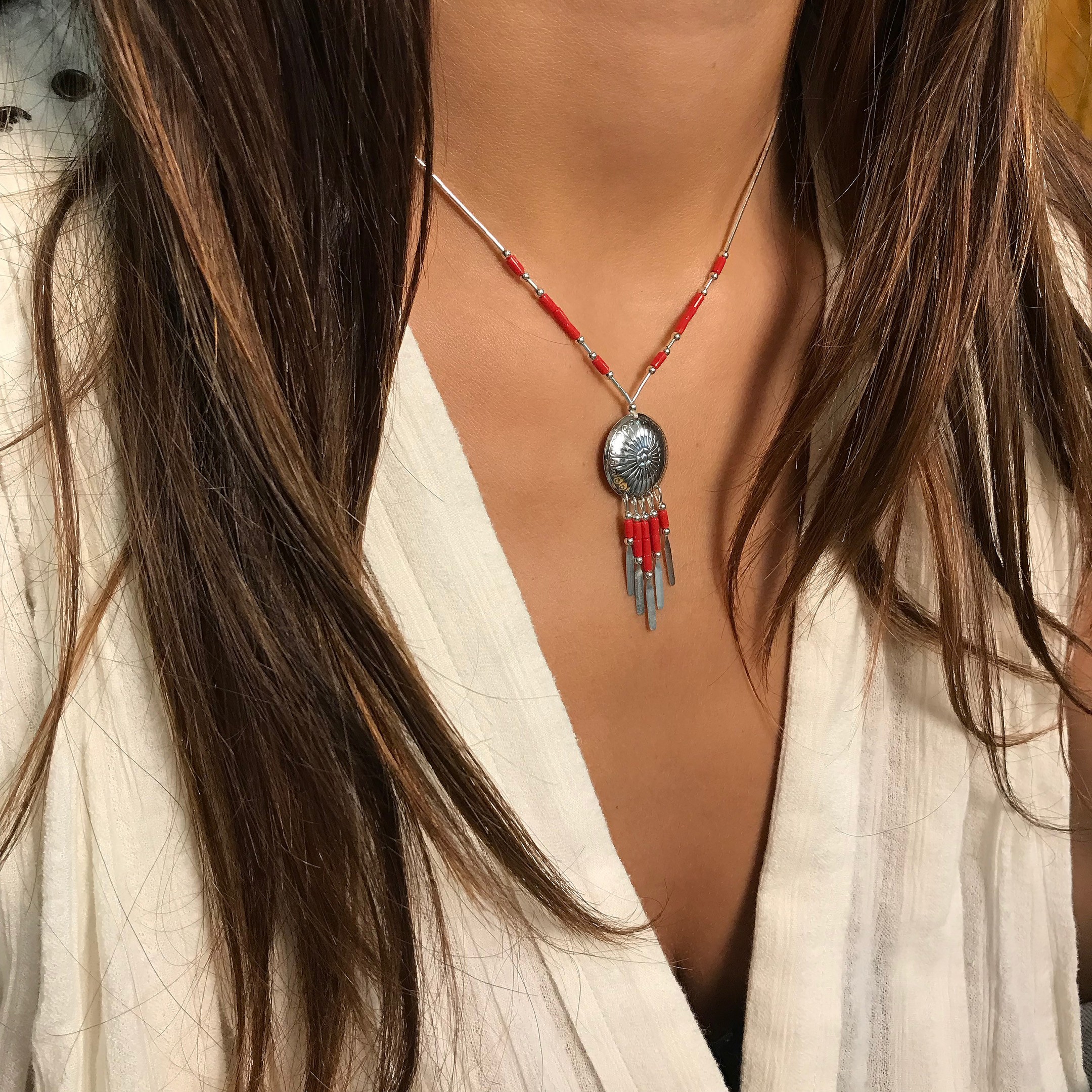 "Native American concho necklace made of Heishi beads. Harpo Paris"