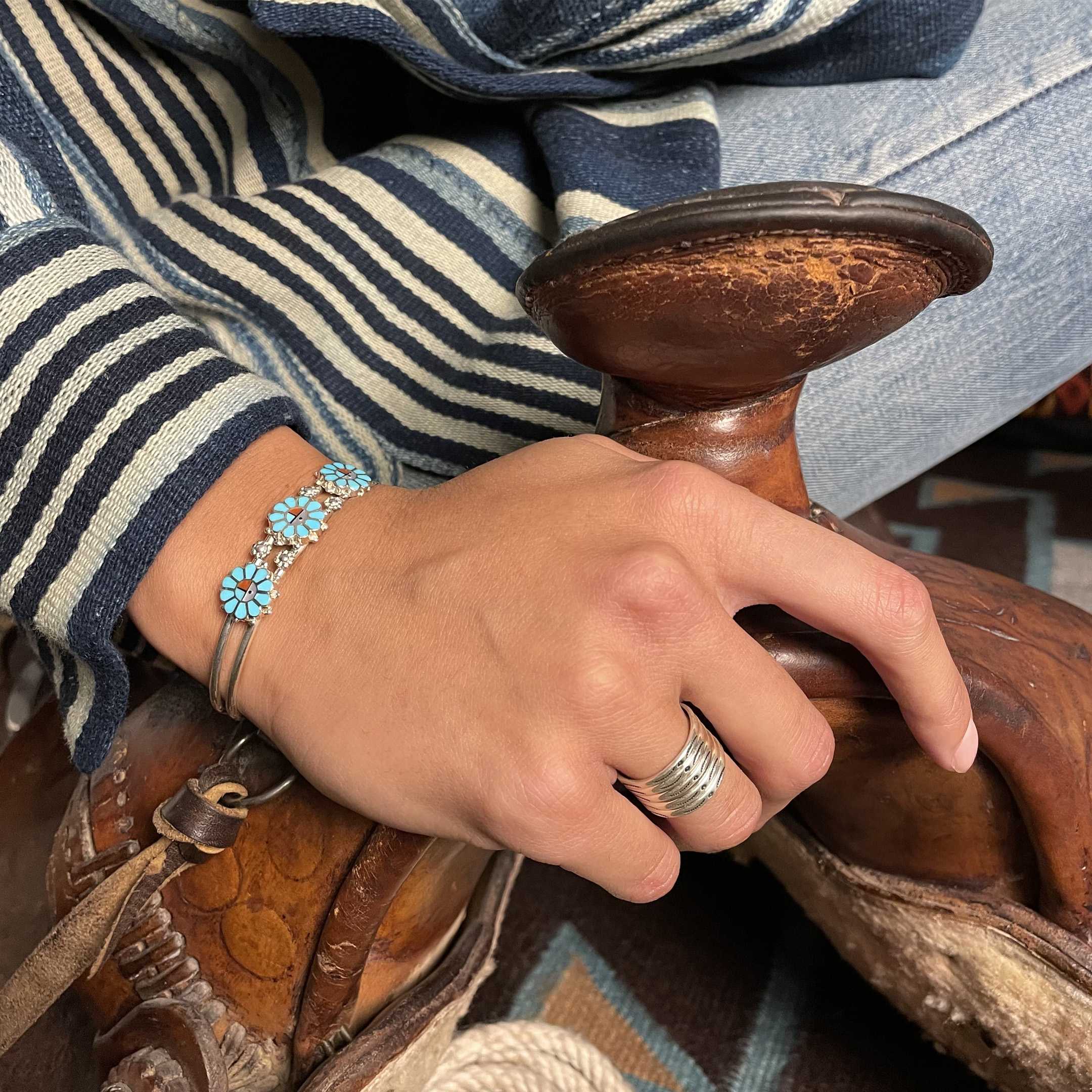 Zuni bracelet with three little Sunfaces